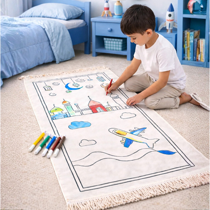 Child coloring on a prayer mat